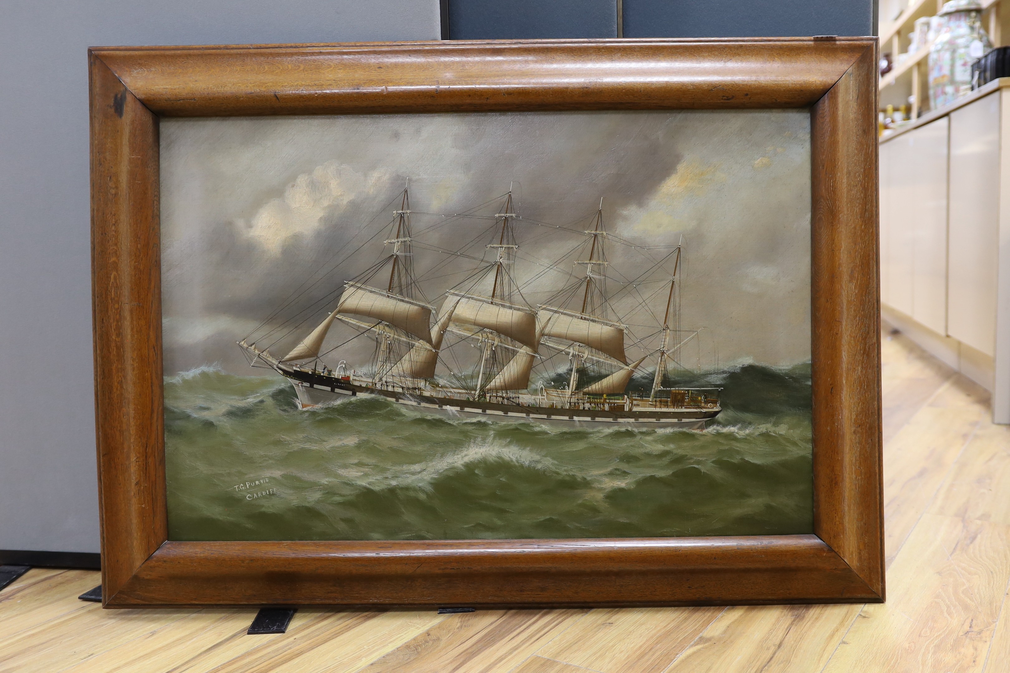 Thomas G. Purvis of Cardiff (1861-1933), oil on canvas, Four master merchant ship 'Colony' at sea, signed, 58 x 89cm